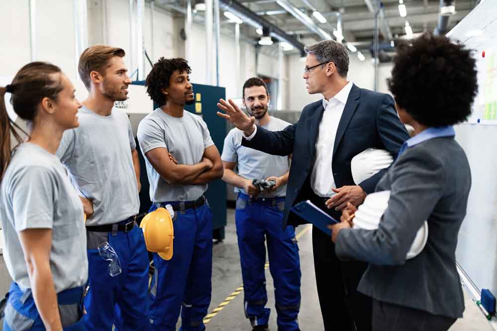 Meeting and discussion within a manufacturing facility